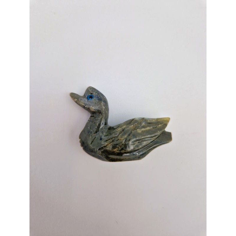 Canard en pierre, sculture animale